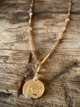 gold chain with roman coin
